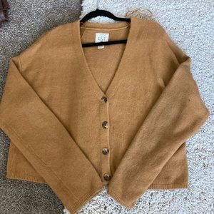 Tan, brown cropped button down billabong sweater.